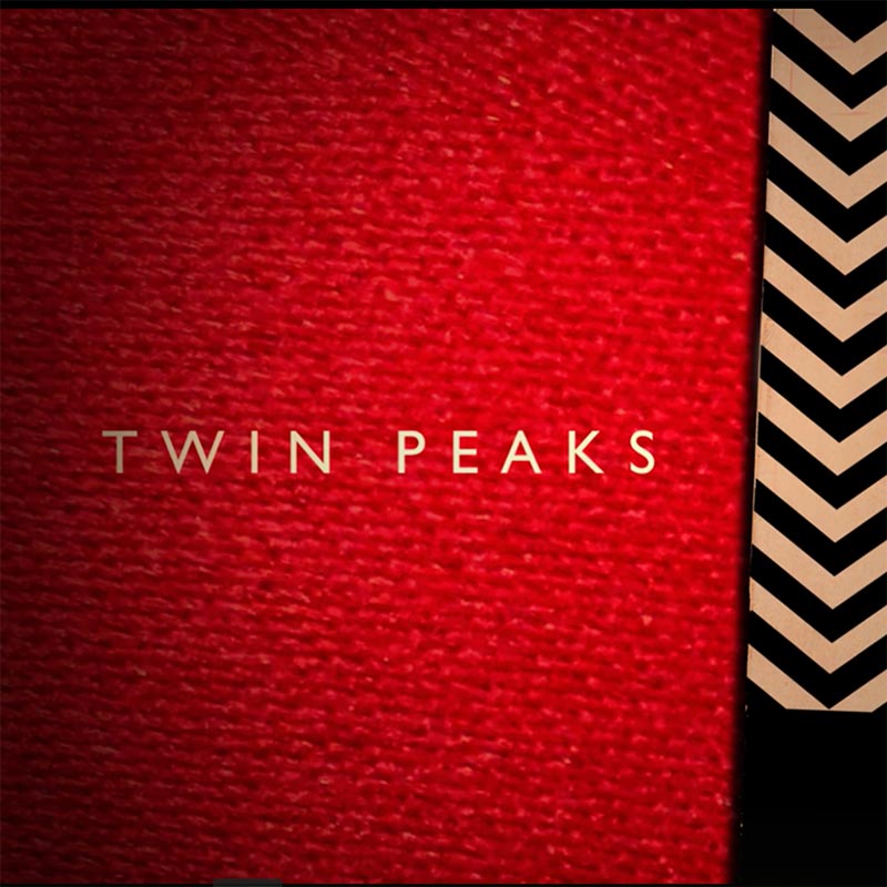 Red background with the words Twin Peaks on it