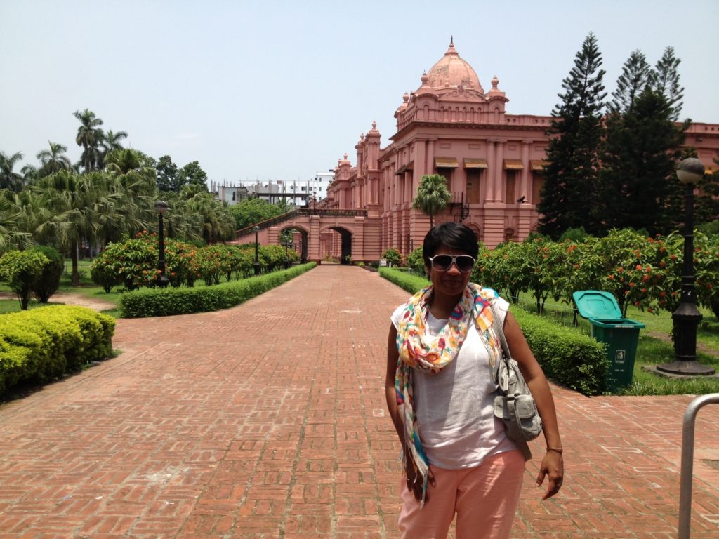 Posing in front of the Pink Palace in Dhaka.