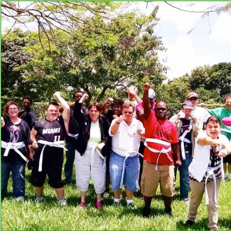 Disabled individuals celebrating