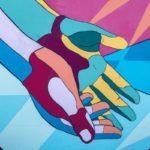 Photo by Tim Mossholder of a mural of brightly colored hands joined and reaching down.