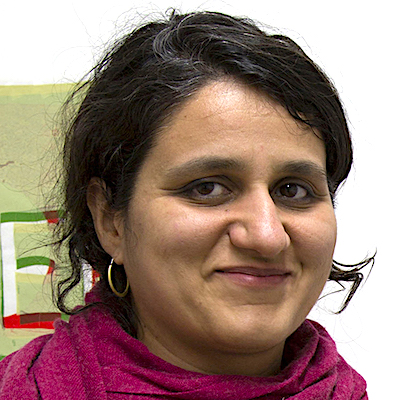 Image of Afghan American woman with a red scarf.